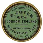 Cap box, 1-3/4" diameter, 
empty, with antique style label marked, 
F. Joyce & Co London England Metal Lined Percusison Caps F4 No. 26